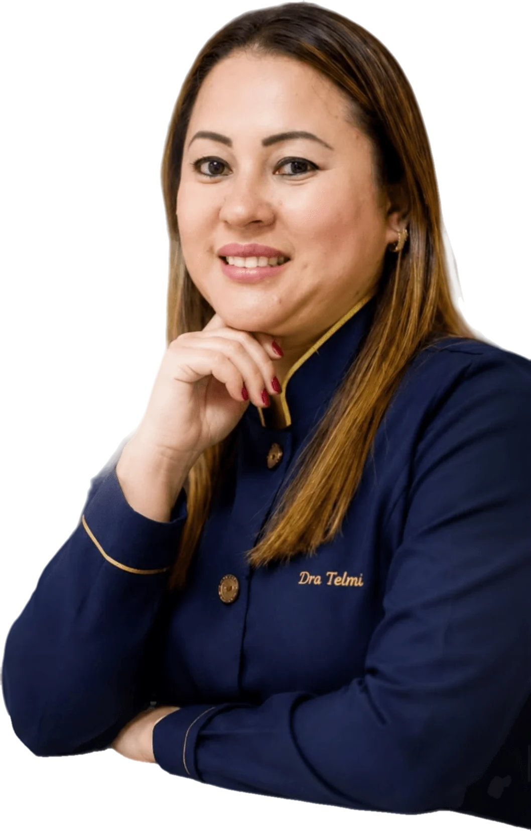 Dra. Telmi Kawagoe sorrindo, de jaleco azul-marinho com vivo dourado, a mão apoiada no queixo